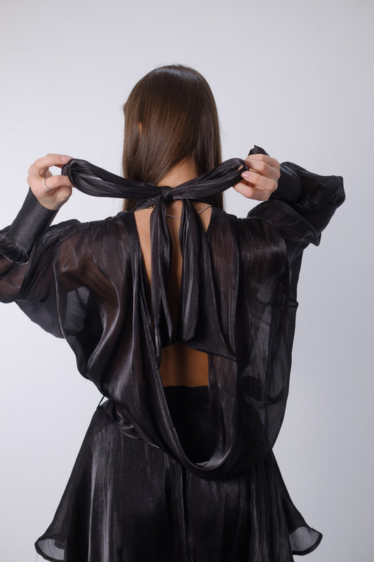 Abito in raso lucido a balze