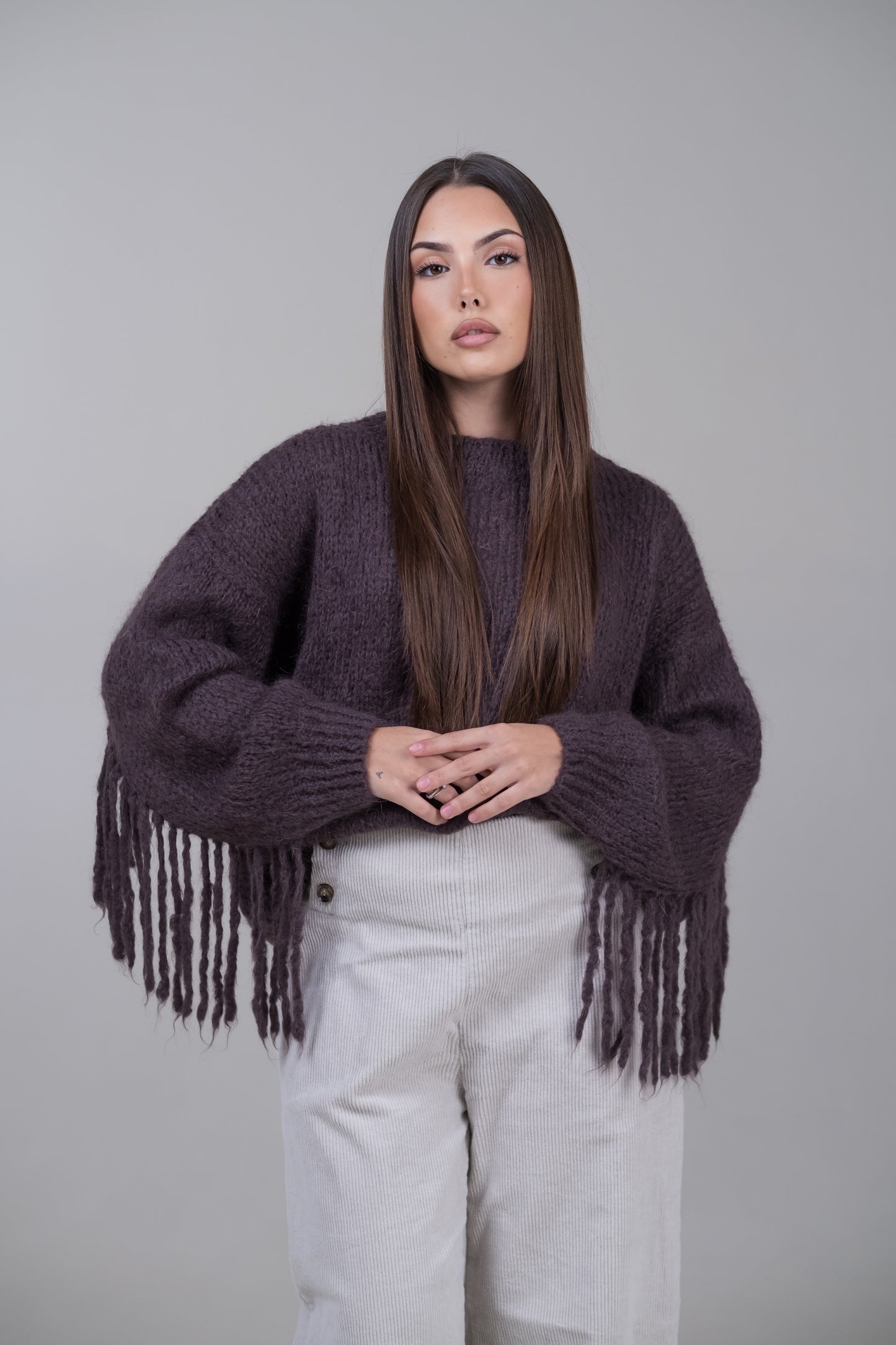 Pullover in mohair con frange