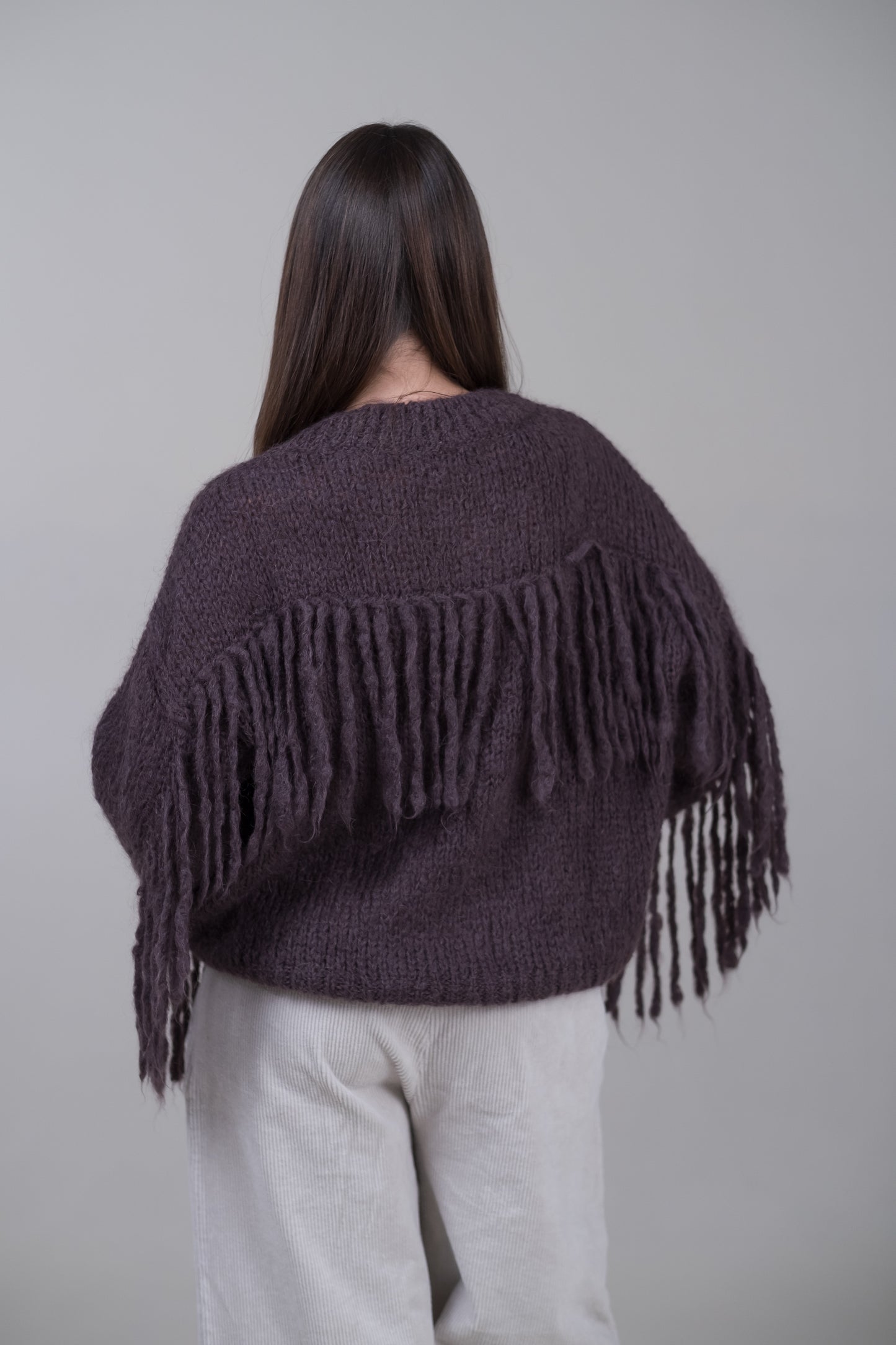 Pullover in mohair con frange