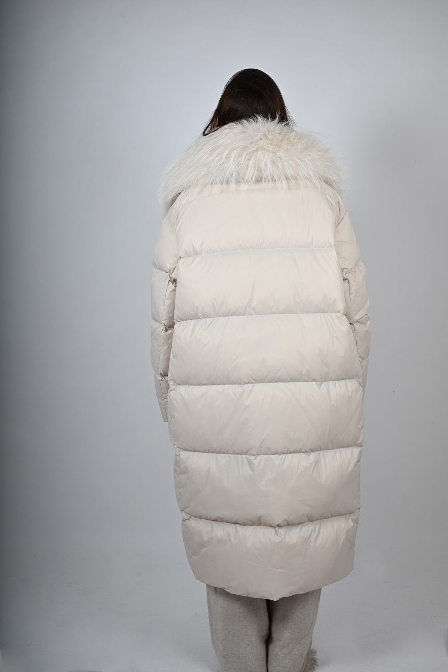 Piumino imbottito con pelliccia