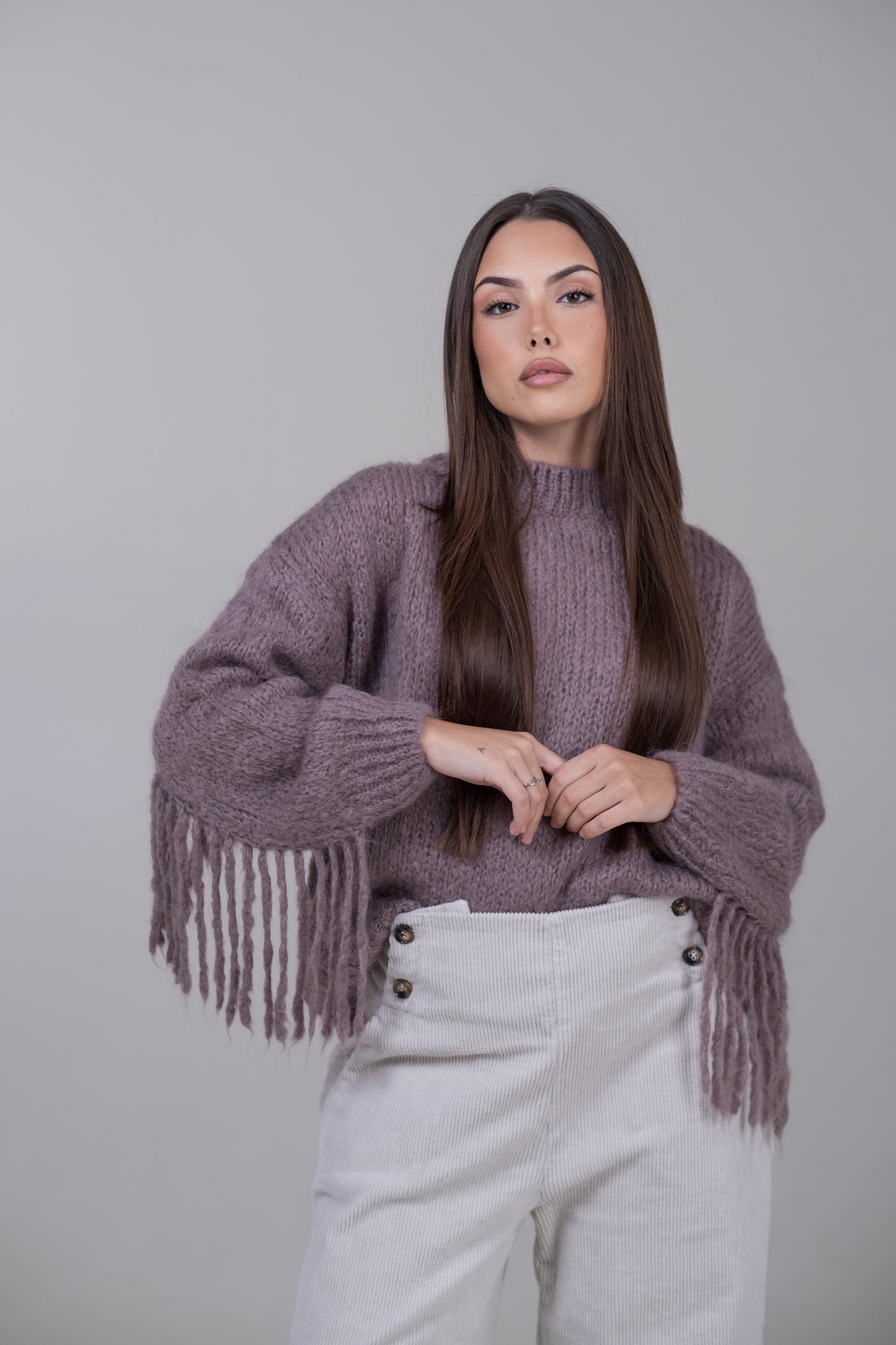 Pullover in mohair con frange